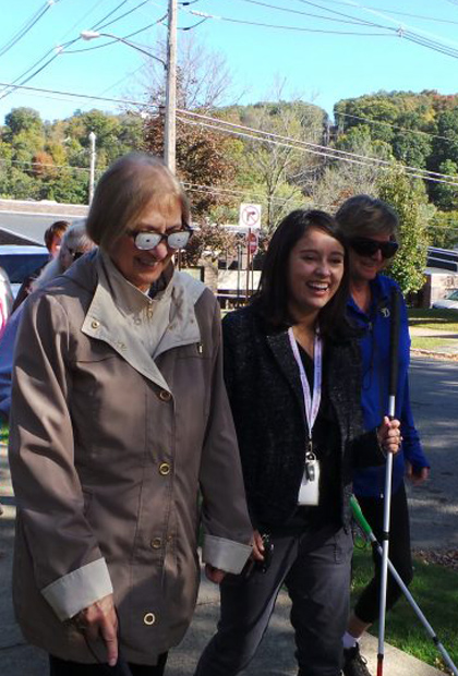 Small group walking on the White Cane walk